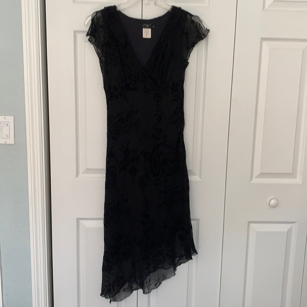 Black dress with sheer overlay